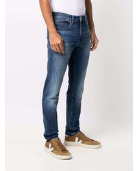 dunkelblaue enge Jeans mit Destroyed-Effekten von Tommy Jeans