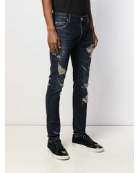 dunkelblaue enge Jeans mit Destroyed-Effekten von Balmain