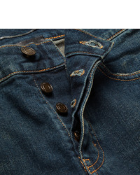 dunkelblaue enge Jeans mit Destroyed-Effekten von Saint Laurent