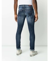 dunkelblaue enge Jeans mit Destroyed-Effekten von Dondup