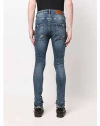 dunkelblaue enge Jeans mit Destroyed-Effekten von Flaneur Homme