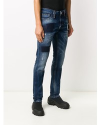 dunkelblaue enge Jeans mit Destroyed-Effekten von Philipp Plein