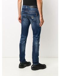 dunkelblaue enge Jeans mit Destroyed-Effekten von Philipp Plein