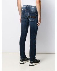 dunkelblaue enge Jeans mit Destroyed-Effekten von Philipp Plein