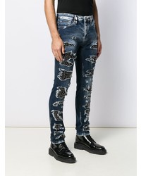 dunkelblaue enge Jeans mit Destroyed-Effekten von Philipp Plein