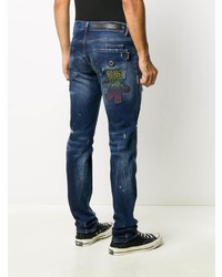 dunkelblaue enge Jeans mit Destroyed-Effekten von Philipp Plein