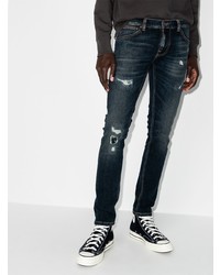 dunkelblaue enge Jeans mit Destroyed-Effekten von Nudie Jeans