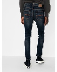 dunkelblaue enge Jeans mit Destroyed-Effekten von Nudie Jeans