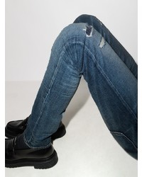 dunkelblaue enge Jeans mit Destroyed-Effekten von Nudie Jeans