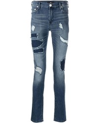 dunkelblaue enge Jeans mit Destroyed-Effekten von True Religion