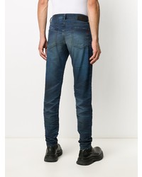 dunkelblaue enge Jeans mit Destroyed-Effekten von Diesel