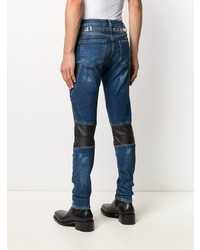 dunkelblaue enge Jeans mit Flicken von Philipp Plein