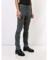dunkelblaue enge Jeans mit Flicken von Alchemist