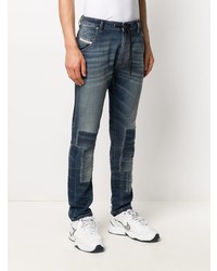dunkelblaue enge Jeans mit Flicken von Diesel