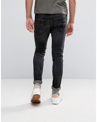 dunkelblaue enge Jeans von Wrangler