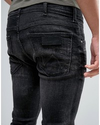 dunkelblaue enge Jeans von Wrangler