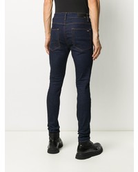 dunkelblaue enge Jeans von Amiri