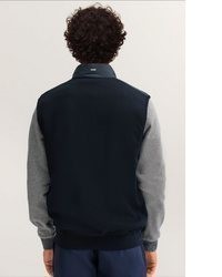 dunkelblaue gesteppte ärmellose Jacke von Bugatti