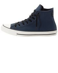 dunkelblaue hohe Sneakers aus Segeltuch von Converse