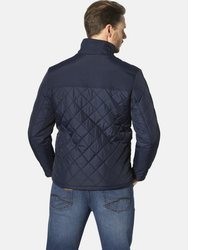 dunkelblaue Jacke mit einer Kentkragen und Knöpfen von Jan Vanderstorm