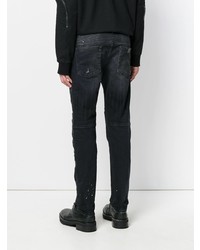 dunkelblaue Jeans mit Destroyed-Effekten von Marcelo Burlon County of Milan