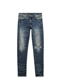 dunkelblaue Jeans mit Destroyed-Effekten von Amiri