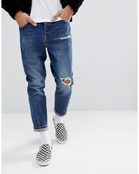 dunkelblaue Jeans mit Destroyed-Effekten von ASOS DESIGN