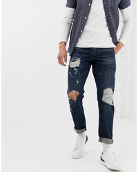 dunkelblaue Jeans mit Destroyed-Effekten von ASOS DESIGN