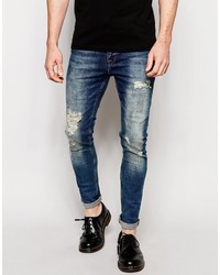 dunkelblaue Jeans mit Destroyed-Effekten von Asos