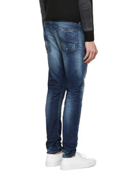 dunkelblaue Jeans mit Destroyed-Effekten von Diesel