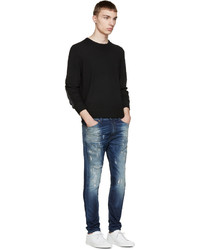 dunkelblaue Jeans mit Destroyed-Effekten von Diesel