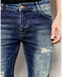 dunkelblaue Jeans mit Destroyed-Effekten von Asos