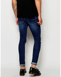 dunkelblaue Jeans mit Destroyed-Effekten von Asos