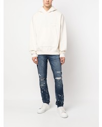 dunkelblaue Jeans mit Destroyed-Effekten von Ksubi