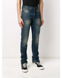 dunkelblaue Jeans mit Destroyed-Effekten von Off-White