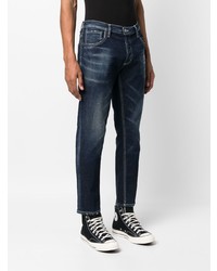 dunkelblaue Jeans mit Destroyed-Effekten von Dondup