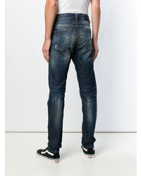 dunkelblaue Jeans mit Destroyed-Effekten von Diesel