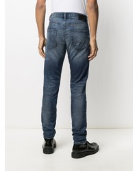 dunkelblaue Jeans mit Destroyed-Effekten von Diesel