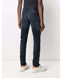 dunkelblaue Jeans mit Destroyed-Effekten von Diesel