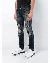 dunkelblaue Jeans mit Destroyed-Effekten von Fagassent