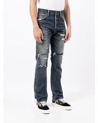 dunkelblaue Jeans mit Destroyed-Effekten von VISVIM