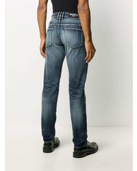 dunkelblaue Jeans mit Destroyed-Effekten von Balmain