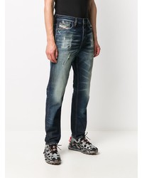 dunkelblaue Jeans mit Destroyed-Effekten von Diesel