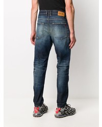 dunkelblaue Jeans mit Destroyed-Effekten von Diesel