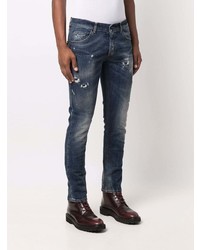 dunkelblaue Jeans mit Destroyed-Effekten von Dondup