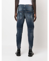 dunkelblaue Jeans mit Destroyed-Effekten von Dondup