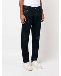 dunkelblaue Jeans mit Destroyed-Effekten von Dondup