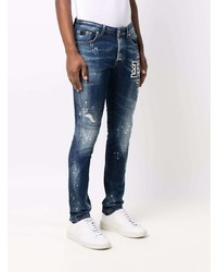 dunkelblaue Jeans mit Destroyed-Effekten von John Richmond