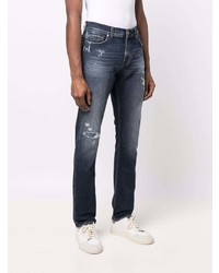 dunkelblaue Jeans mit Destroyed-Effekten von 7 For All Mankind