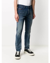 dunkelblaue Jeans mit Destroyed-Effekten von Diesel